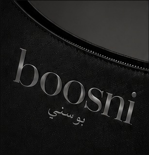 Boosni signature logo detail on black bag